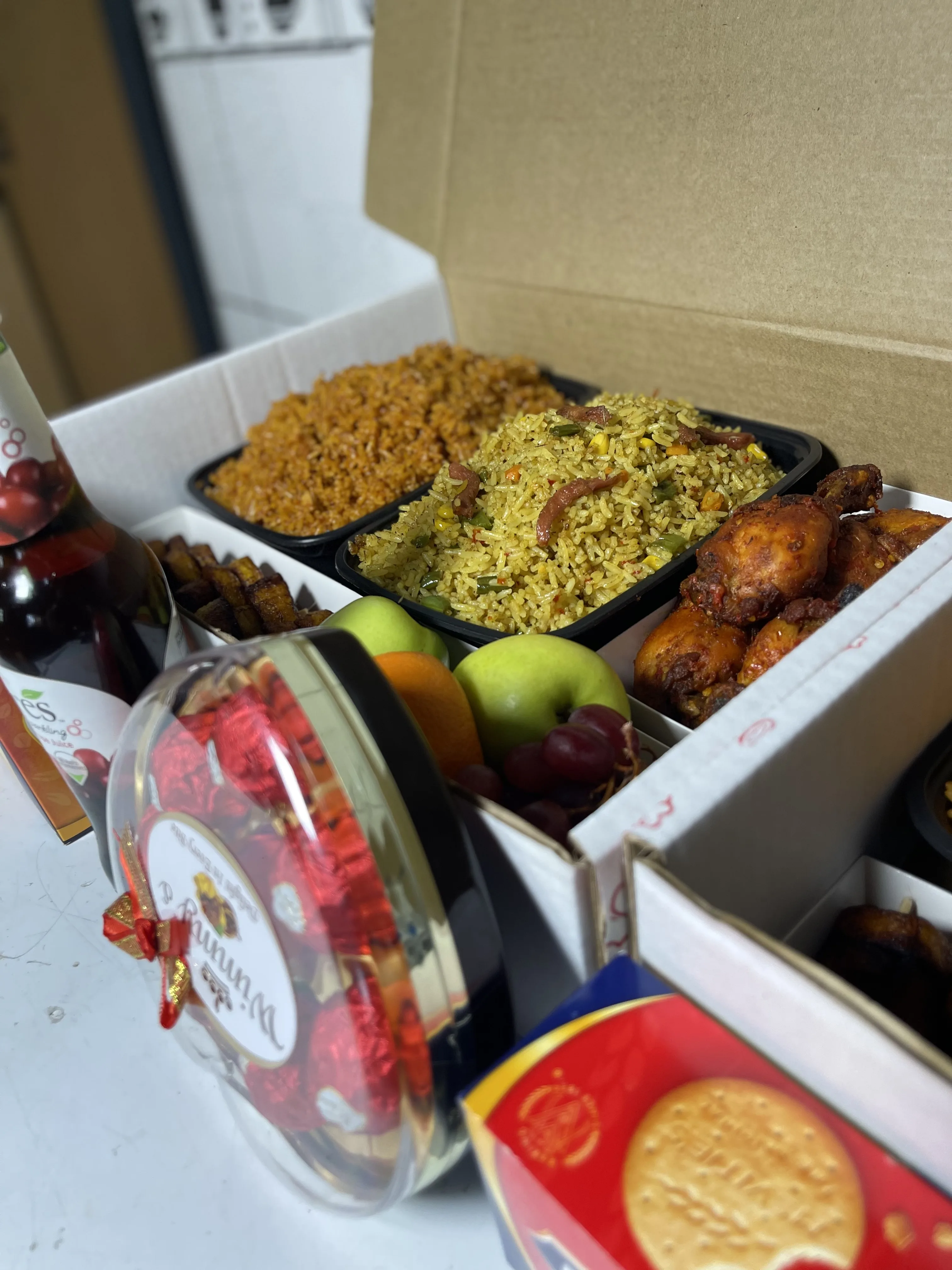 Gift box with rice, plantain, and chicken for breakfast delivery