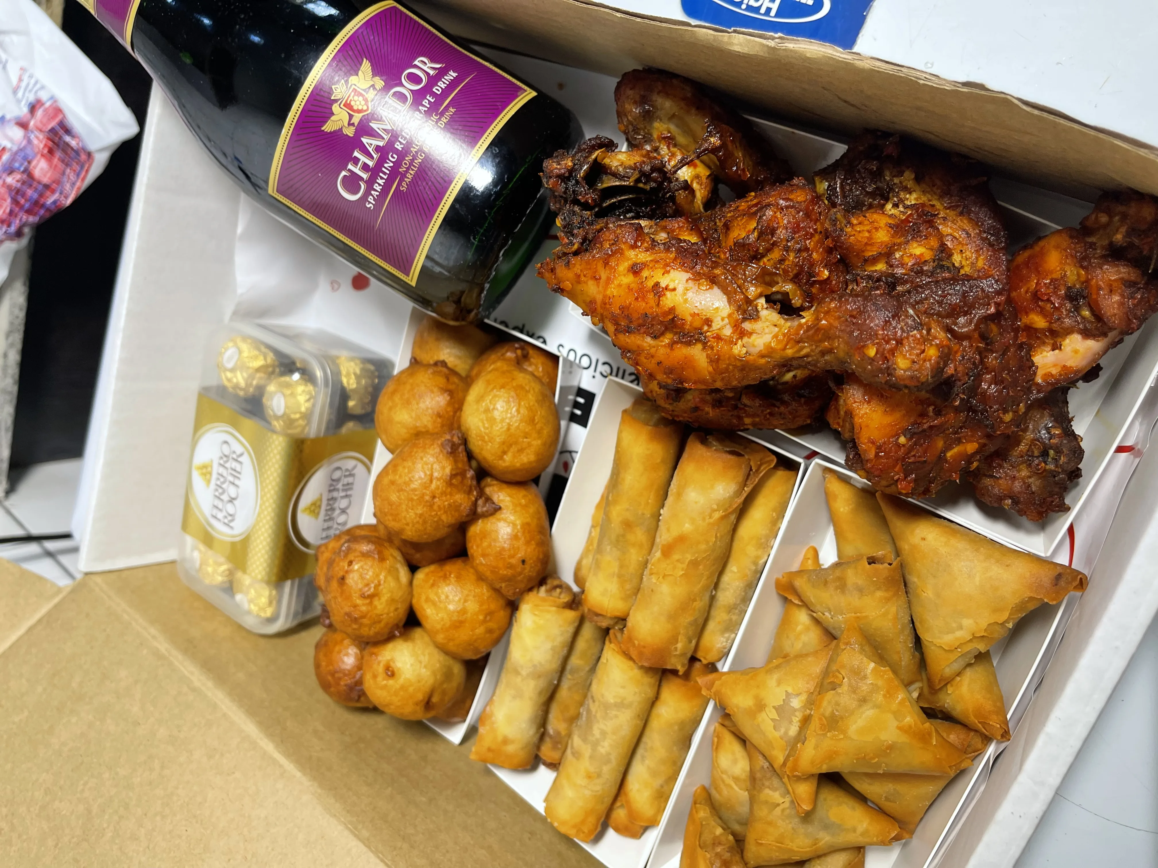 Small chops party box with assorted bite-sized snacks